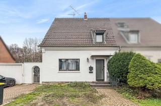 Doppelhaushälfte kaufen in 47226 Hochemmerich, Charmante Doppelhaushälfte mit idyllischem Garten in Duisburg-Hochemmerich sucht neue Eigentümer