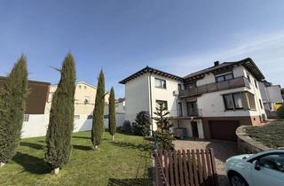 Haus kaufen in Goethestraße, 69226 Nußloch, Großzügiges Zweifamilienhaus mit XL-Garten, Garagen & Ausbaureserve!