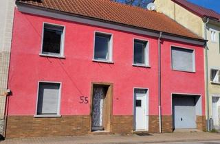 Haus kaufen in 66701 Beckingen, Honzrath: Reihenmittelhaus 106m² mit Ausbaupotenzial – 2 Einheiten möglich, Garage und Hofgarten