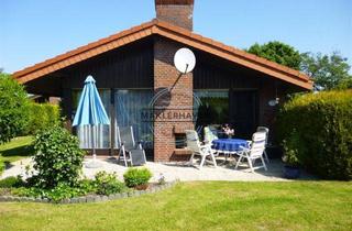 Einfamilienhaus kaufen in 26969 Butjadingen, Meeresbrise & Kaminfeuer – winterfestes Nordsee-Refugium für die ganze Familie mit Erstwohnsitzmögl.