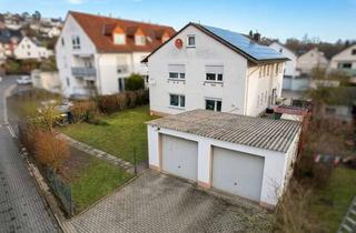Mehrfamilienhaus kaufen in 37688 Beverungen, Massives Mehrfamilienhaus mit Garten, 3 Garagen und PV-Anlage