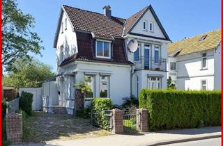 Einfamilienhaus kaufen in 24837 Schleswig, Zeitlose Eleganz -Städtisches Einfamilienhaus mit historischem Flair und kleiner Gartenoase
