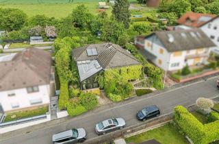 Haus kaufen in 63654 Büdingen, Idyllisch gelegener Bungalow mit viel Potenzial!