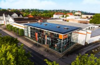 Gewerbeimmobilie kaufen in Kuhtrift, 37269 Eschwege, Repräsentatives Gewerbeobjekt mit Verkaufsflächen und Lagerhallen
