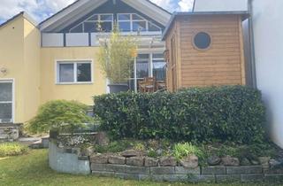 Wohnung kaufen in 63694 Limeshain, Großzügige Eigentumswohnung mit Garten, großer Terrasse und Blockhaussauna in Limeshain