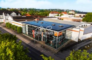 Gewerbeimmobilie kaufen in 37269 Eschwege, Repräsentatives Gewerbeobjekt mit Verkaufsflächen und Lagerhallen