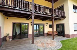 Villa kaufen in 63825 Blankenbach, Architektenvilla in ruhiger Hanglage mit Wellnessbereich und Koiteich