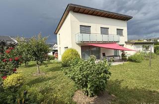 Einfamilienhaus kaufen in 79790 Küssaberg, Modernes, freistehendes Einfamilienhaus mit einladender Terrasse und herrlichem Garten