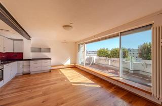 Wohnung kaufen in 80799 München, AIGNER - Hochwertig ausgestattete 3-Zimmer-Wohnung mit zwei Bädern und Südterrasse