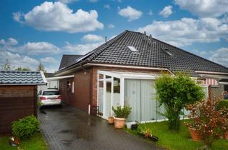 Doppelhaushälfte kaufen in 26506 Norden, Norden Nähe Norddeich: Schöne Bungalowhälfte mit Wintergarten