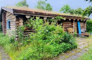 Haus kaufen in 23758 Kükelühn, Idyllisches Blockhaus auf großzügigem Grundstück in ruhiger Lage der Gemeinde Wangels!