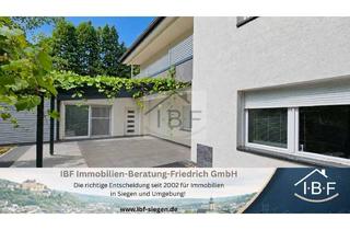 Wohnung kaufen in 57250 Netphen, Großzügige Souterrainwohnung mit weitläufiger Terrasse