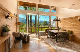 Wohnung kaufen in 83700 Rottach-Egern, Ein Zuhause zwischen Baumwipfeln mit Bergpanorama und Seeufernähe