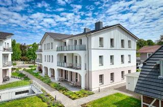 Wohnung kaufen in 18347 Ostseebad Wustrow, Modernes Ferienapartment im Erdgeschoss mit Süd-West Terrasse und Kamin