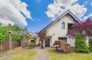 Einfamilienhaus kaufen in 14974 Ludwigsfelde, Geräumiges Einfamilienhaus mit Wintergarten, Terrasse und Pool im Flussviertel!