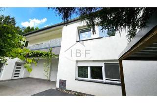 Haus kaufen in 57250 Netphen, Großzügiges Zweifamilienhaus auf weitläufigem Grundstück – bereits nach WEG geteilt