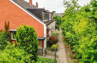 Haus kaufen in 29313 Hambühren, Sanierungsbedürftiges Reihenendhaus mit 2 Garagen