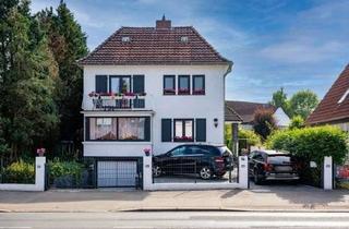 Haus kaufen in 27749 Mitte, Stadthaus in Delmenhorst mit Garage und herrlichem Garten