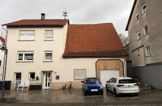 Mehrfamilienhaus kaufen in 72574 Bad Urach, Mehrfamilienhaus mit Garten, Garage und zwei Stellplätzenin Bad Urach - Wittlingen
