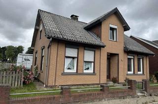 Einfamilienhaus kaufen in 25712 Buchholz, Wohnidylle mit Potenzial – Charmantes Einfamilienhaus wartet auf Sie