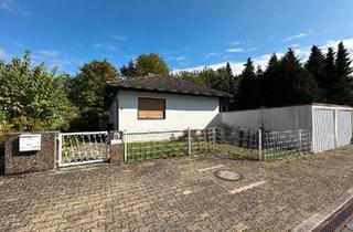 Einfamilienhaus kaufen in 61476 Kronberg, Kronberg im Taunus - Ebenerdiges Einfamilienhaus auf großem Grundstück in Kronberg