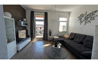 Wohnung kaufen in 76761 Rülzheim, Rülzheim - Stilvolle 3,5-Zimmer-Wohnung (+Abstellkammer) mit Balkon