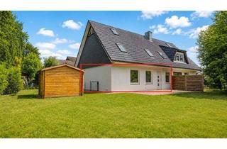 Wohnung kaufen in 25421 Pinneberg, Moderne Erdgeschosswohnung mit großem Garten