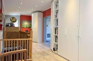 Wohnung kaufen in 49124 Georgsmarienhütte, Ihr privates Reich auf zwei Ebenen: Großzügige Maisonettewohnung mit Gartenoase und Partyhütte
