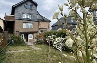 Wohnung kaufen in 44805 Bergen, Ihr grünes Zuhause: Charmante Maisonettewohnung mit eigenem Eingang und großem Gartenparadies