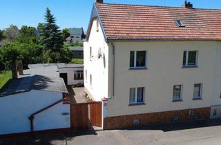 Haus kaufen in 39240 Breitenhagen, Wohnhaus mit vermieteter Einliegerwohnung Werkstatt, Nebengelass und Garten in Breitenhagen