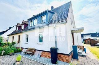 Einfamilienhaus kaufen in 34253 Lohfelden, Modernisierte Doppelhaushälfte mit großem Grundstück und vielen Extras