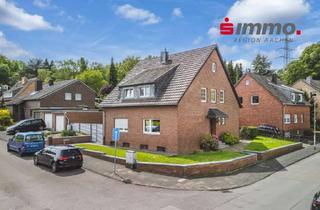 Haus kaufen in 52134 Herzogenrath, Freistehendes Zweifamilienhaus mit Garten, Balkon und 2 Garagen in bevorzugter Wohnlage am Rande des