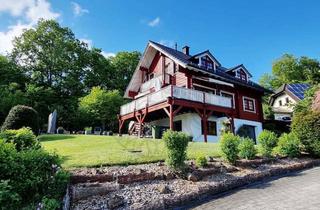Haus kaufen in 56457 Westerburg, Westerburg: Neuwertiges Holzhaus mit Schlossblick, Garage und Garten in ruhiger Stadtrandlage