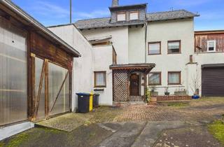 Einfamilienhaus kaufen in 56348 Bornich, Einfamilienhaus mit Garage, Werkstatt und Einliegerwohnung in Bornich zu verkaufen