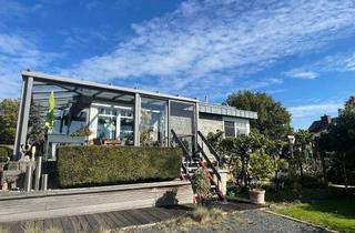 Haus kaufen in 52511 Geilenkirchen, Besonderer Bungalow mit viel Potential in mitten von Geilenkirchen