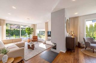 Einfamilienhaus kaufen in 82064 Straßlach-Dingharting, Modernes Einfamilienhaus mit Wärmepumpe, vier Schlafzimmern und sonnigem Garten
