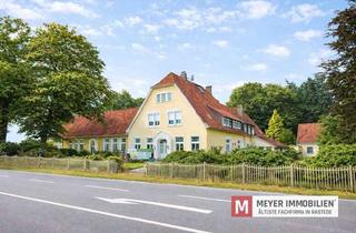 Mehrfamilienhaus kaufen in 27777 Ganderkesee, Mehrfamilienhaus mit Halle und Mieterträgen auf großem Grundstück (Obj.-Nr. 6642)