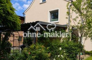 Doppelhaushälfte kaufen in 95349 Thurnau, Modernisierte Doppelhaushälfte mit liebevollem Garten, Bachzugang und Doppelgarage in Hutschdorf