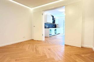 Wohnung kaufen in 80539 Maxvorstadt, Exklusive Altbauwohnung direkt am Englischen Garten