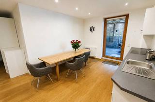 Wohnung kaufen in 94535 Eging am See, Bezugsfreie 2-Zimmer-Wohnung mit Terrasse, Einbauküche, Carport und Außenkamin