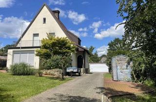 Einfamilienhaus kaufen in 49152 Bad Essen, Charme, Substanz und Perspektive - Einfamilienhaus mit Doppelgarage in Bad Essen – Wittlage!