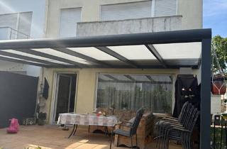 Haus kaufen in 65795 Hattersheim, Charmantes Reihenendhaus mit Garten, Garage und viel Potenzial in zentraler Lage von Hattersheim-Okr