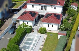 Einfamilienhaus kaufen in 56170 Bendorf, Hochwertiges Einfamilienhaus im Atrium-Bungalowstil in begehrter Blicklage mit Pool und PV-Anlage