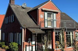 Doppelhaushälfte kaufen in 26736 Krummhörn, Idyllisches Wohnen auf der Warft: Gepflegte Doppelhaushälfte mit Garten und Doppelcarport
