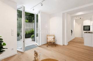 Wohnung kaufen in 80639 München, Souterrain neu gedacht: Helle 3-Zimmer-Wohnung mit großer Ostterrasse -