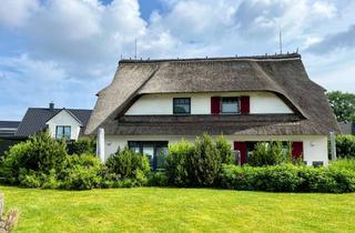 Wohnung kaufen in 23946 Ostseebad Boltenhagen, Ferienanlage am Mariannenweg - Schöne Reetdach–Doppelhaushälfte im Ostseebad Boltenhagen !