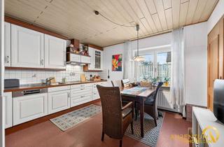 Wohnung kaufen in 93057 Konradsiedlung-Wutzlhofen, Großzügige Erdgeschosswohnung mit Garten und Garage in zentraler Lage