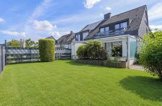 Doppelhaushälfte kaufen in 41352 Korschenbroich, Charmante Doppelhaushälfte mit Garten und Garage in ruhiger, begehrter Wohnlage von Kleinenbroich
