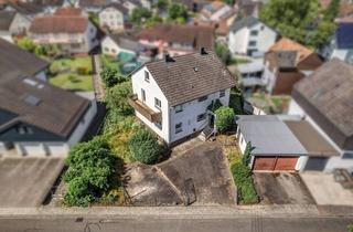 Einfamilienhaus kaufen in 76287 Rheinstetten, Viel Platz für die große Familie! Charmantes Einfamilienhaus in begehrter Lage von Rheinstetten.