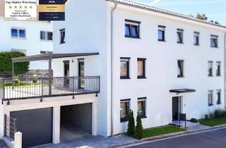 Haus kaufen in 97249 Eisingen, Neuwertiges Wohnensemble mit Einliegerwohnung, großer Sonnenterrasse und Doppelgarage